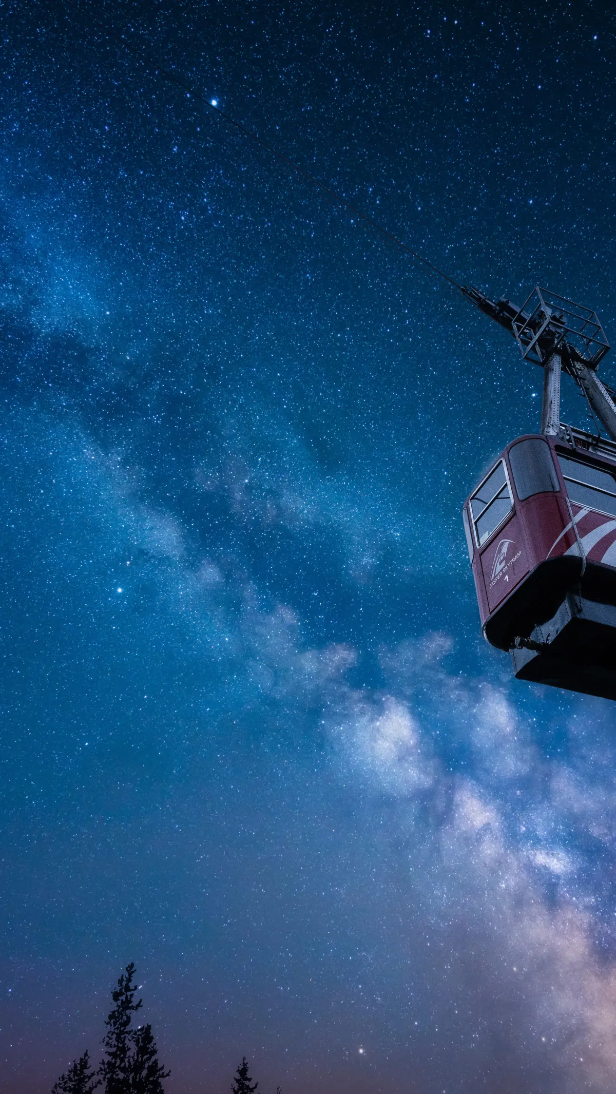 Gondola rising in starry night sky