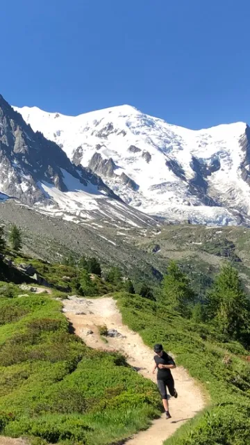 woman running on mountain trail