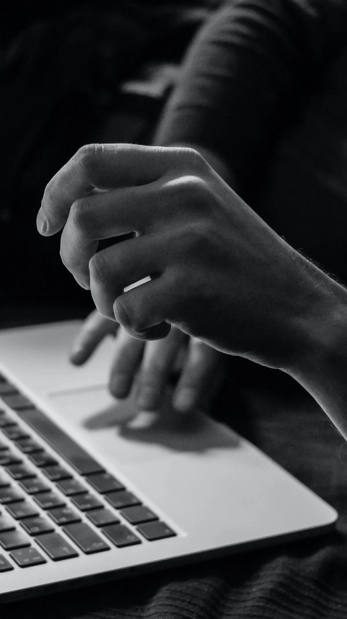 person typing on computer