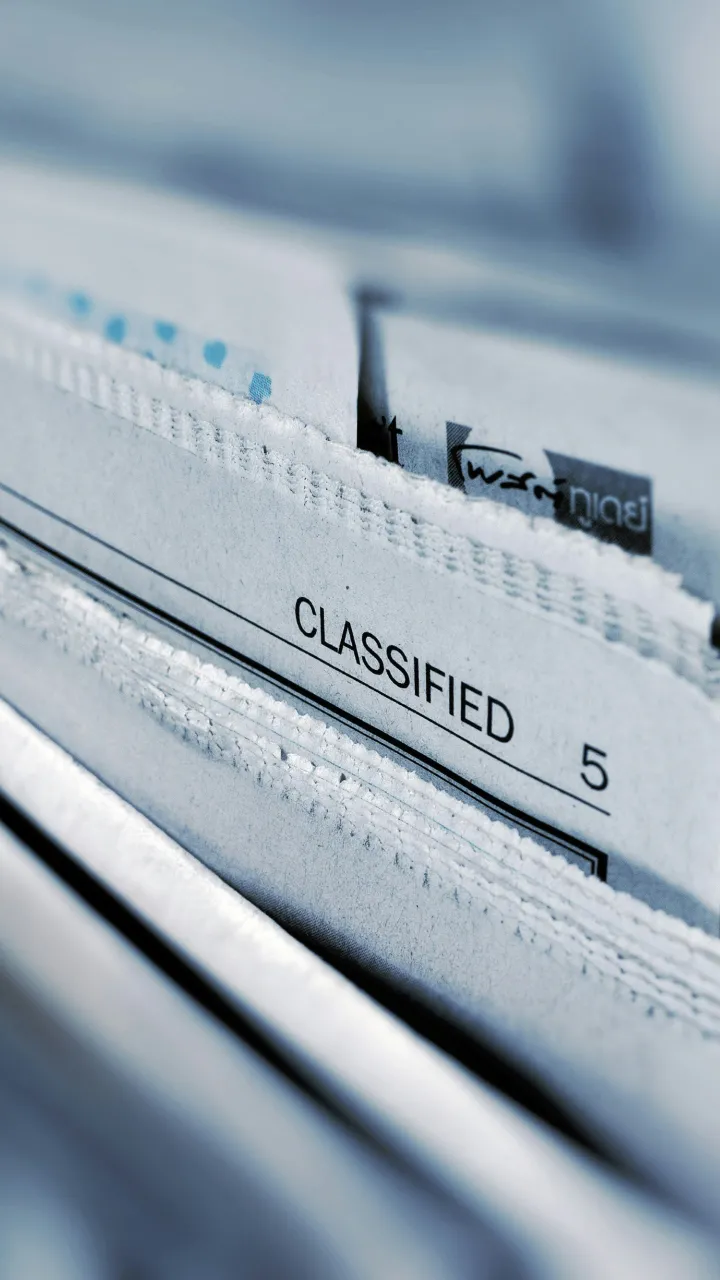 A close up of classified papers