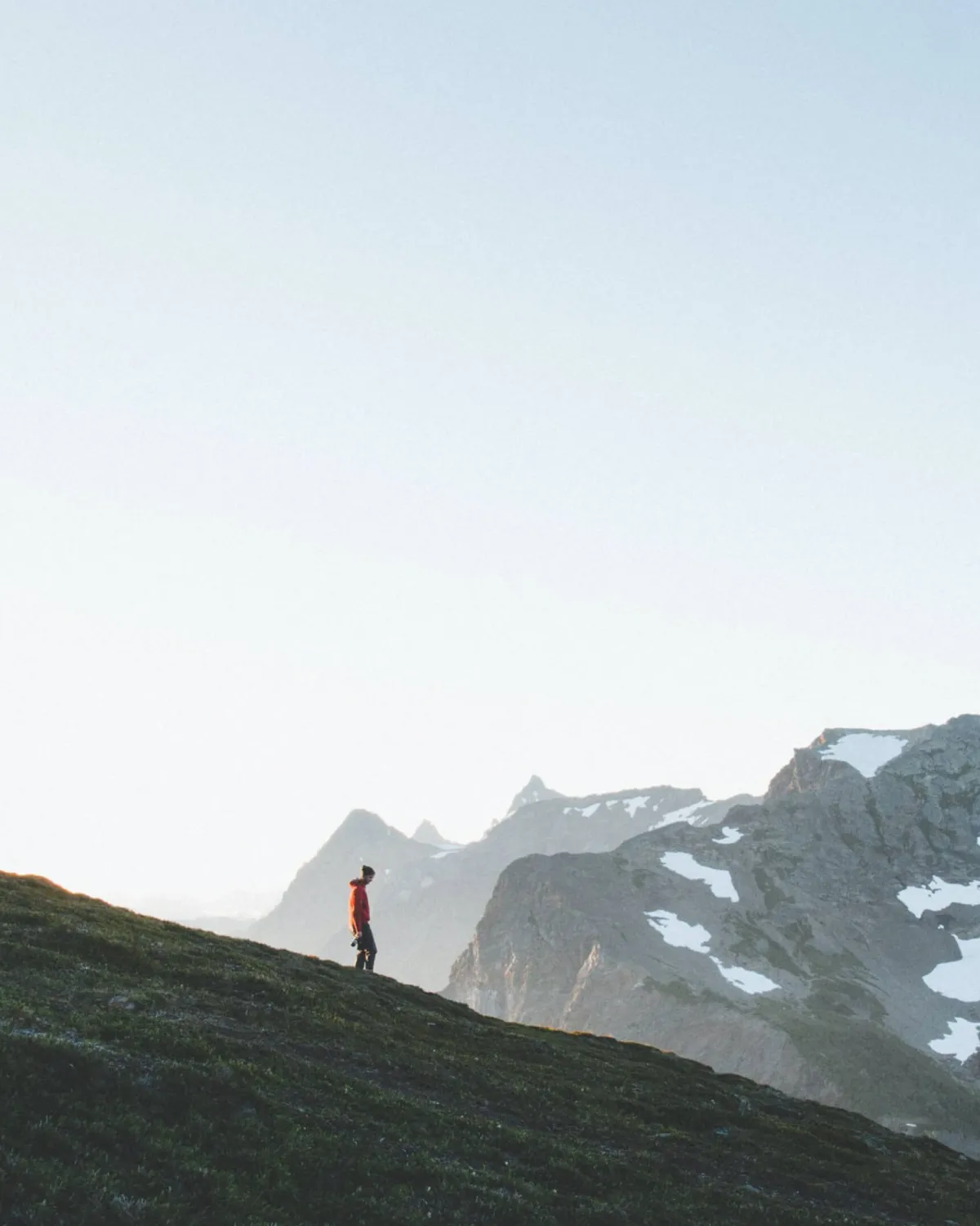 person standing atop a mountain