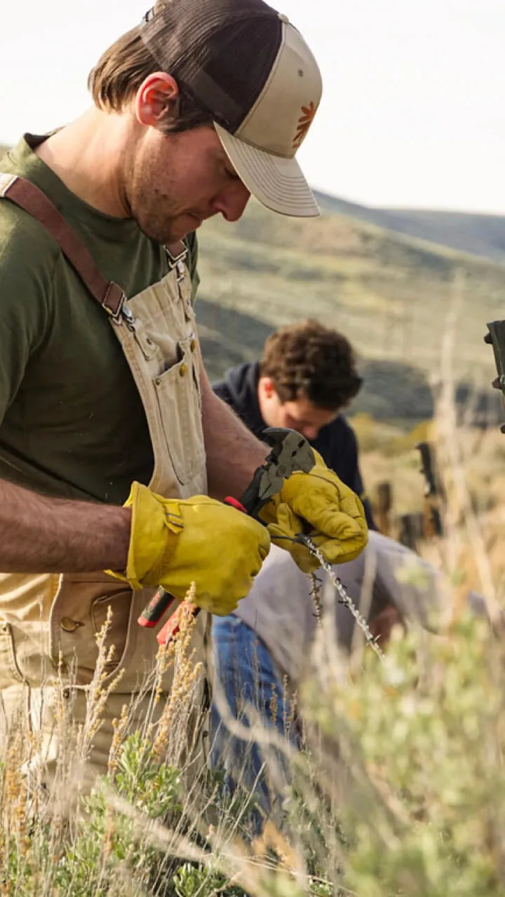 two guys prepping to go hunting