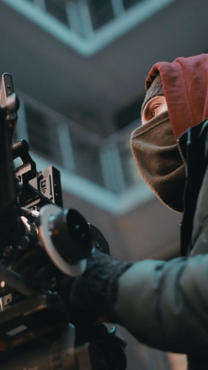 Cinematographer with a mask on