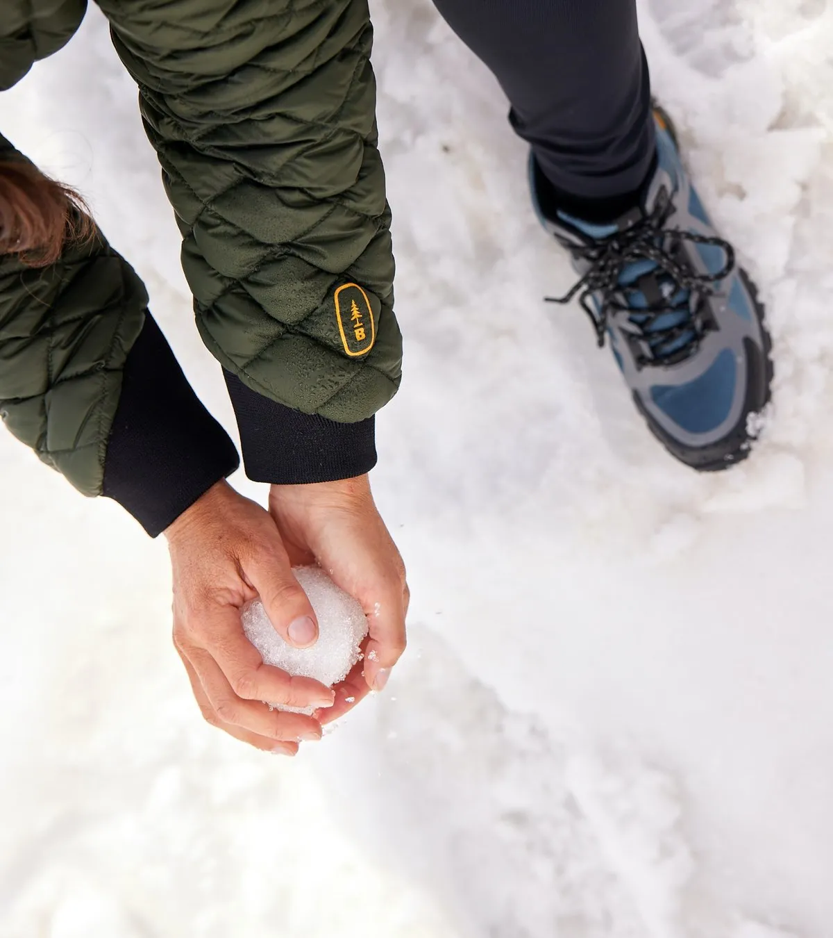 Person making snowball
