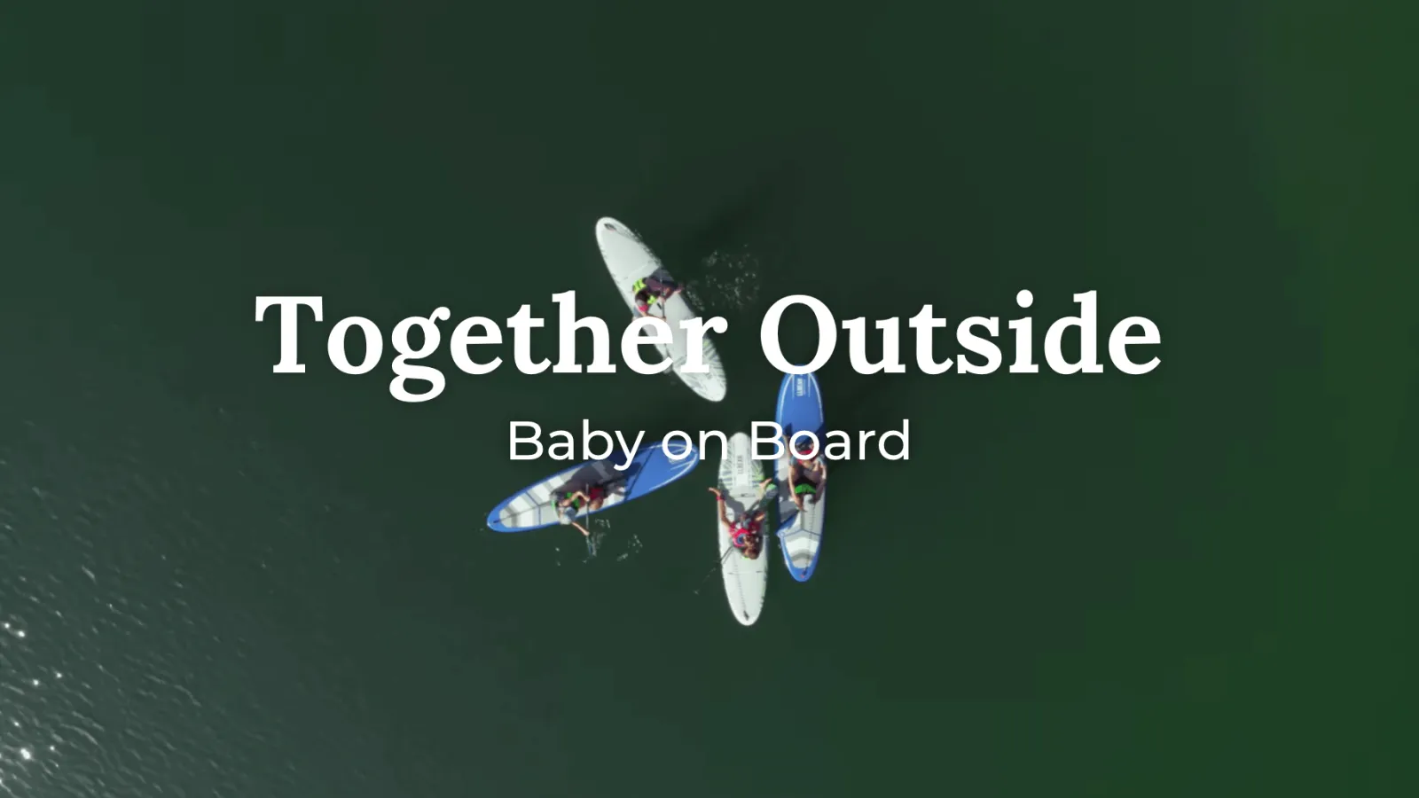 Baby on Board title with a family paddle boarding