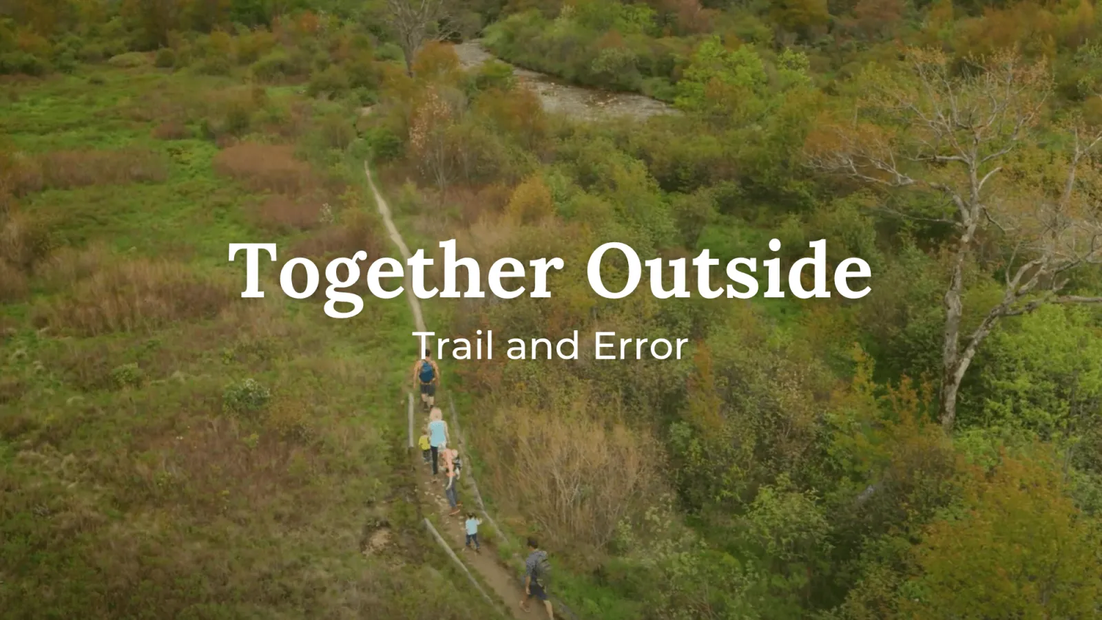 Trail and Error title with aerial image of family hiking