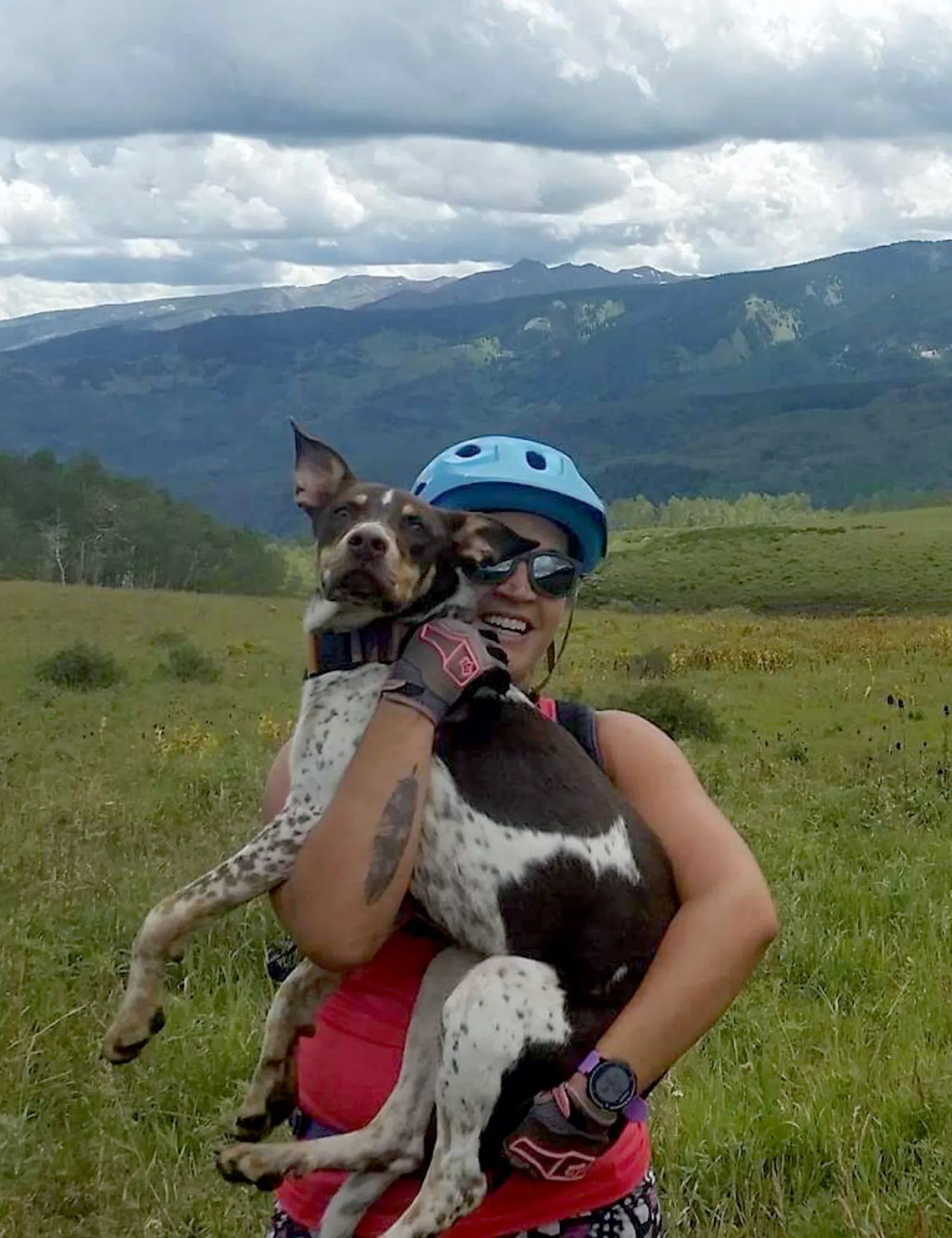 Laura and her dog biking
