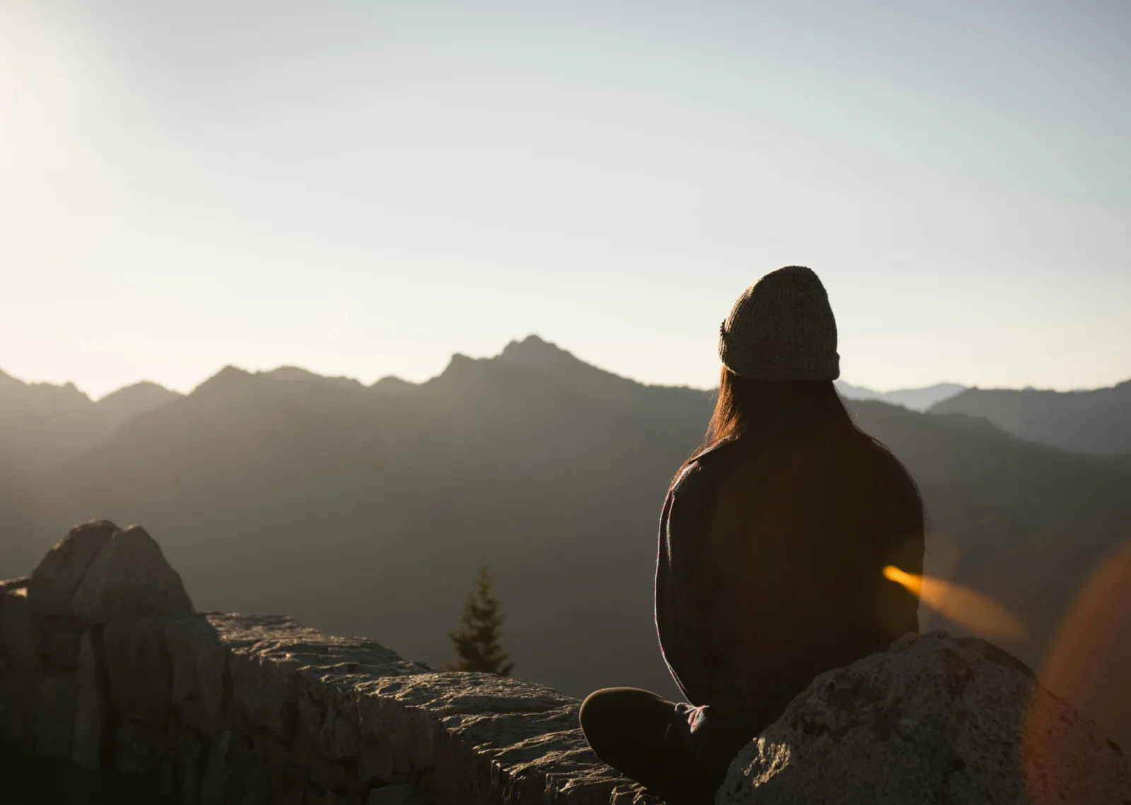 A person sitting on a mountain