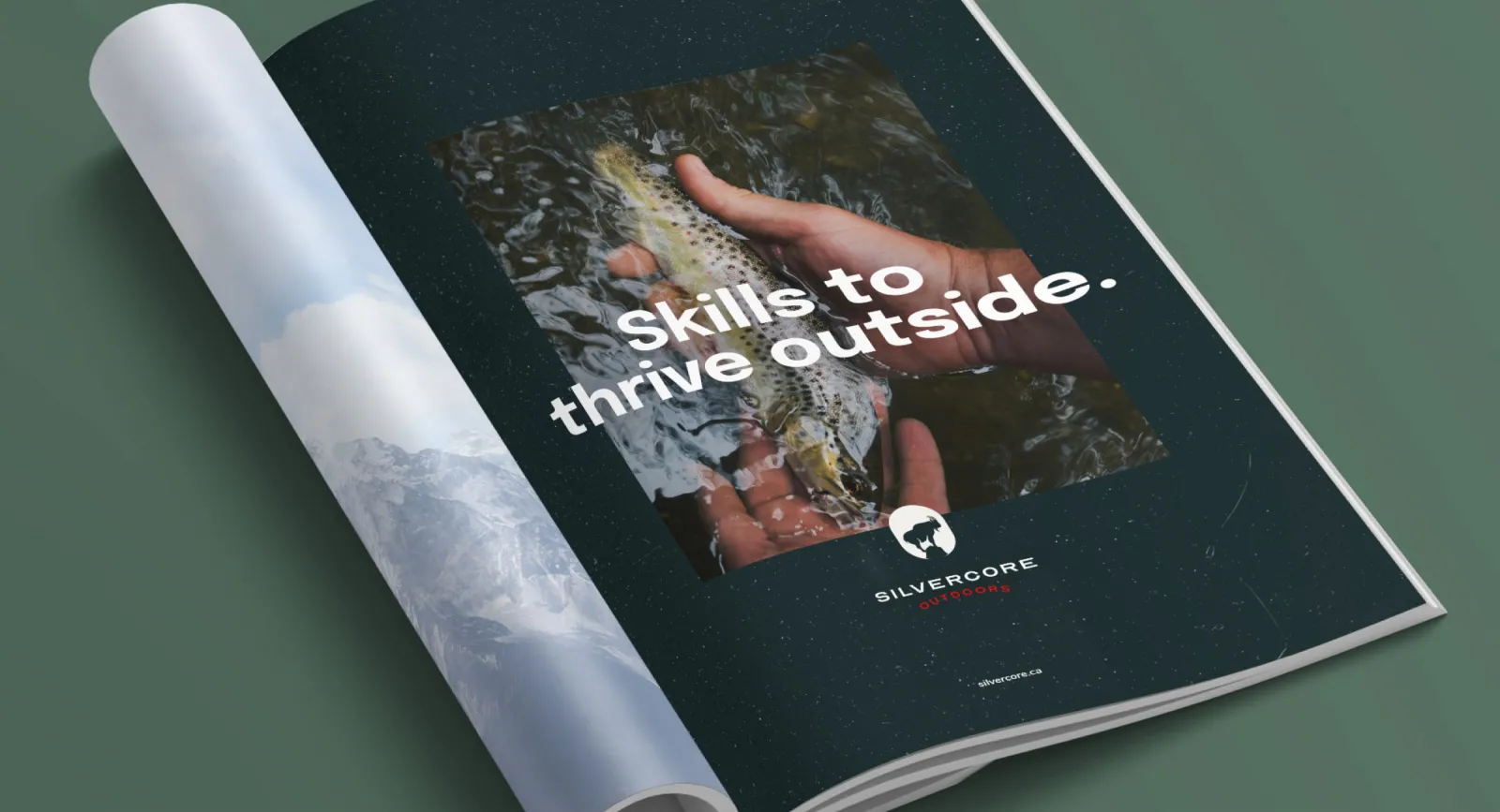 A magazine ad for Silvercore outdoors reading 'Skills to Thrive Outside' atop a fishing image
