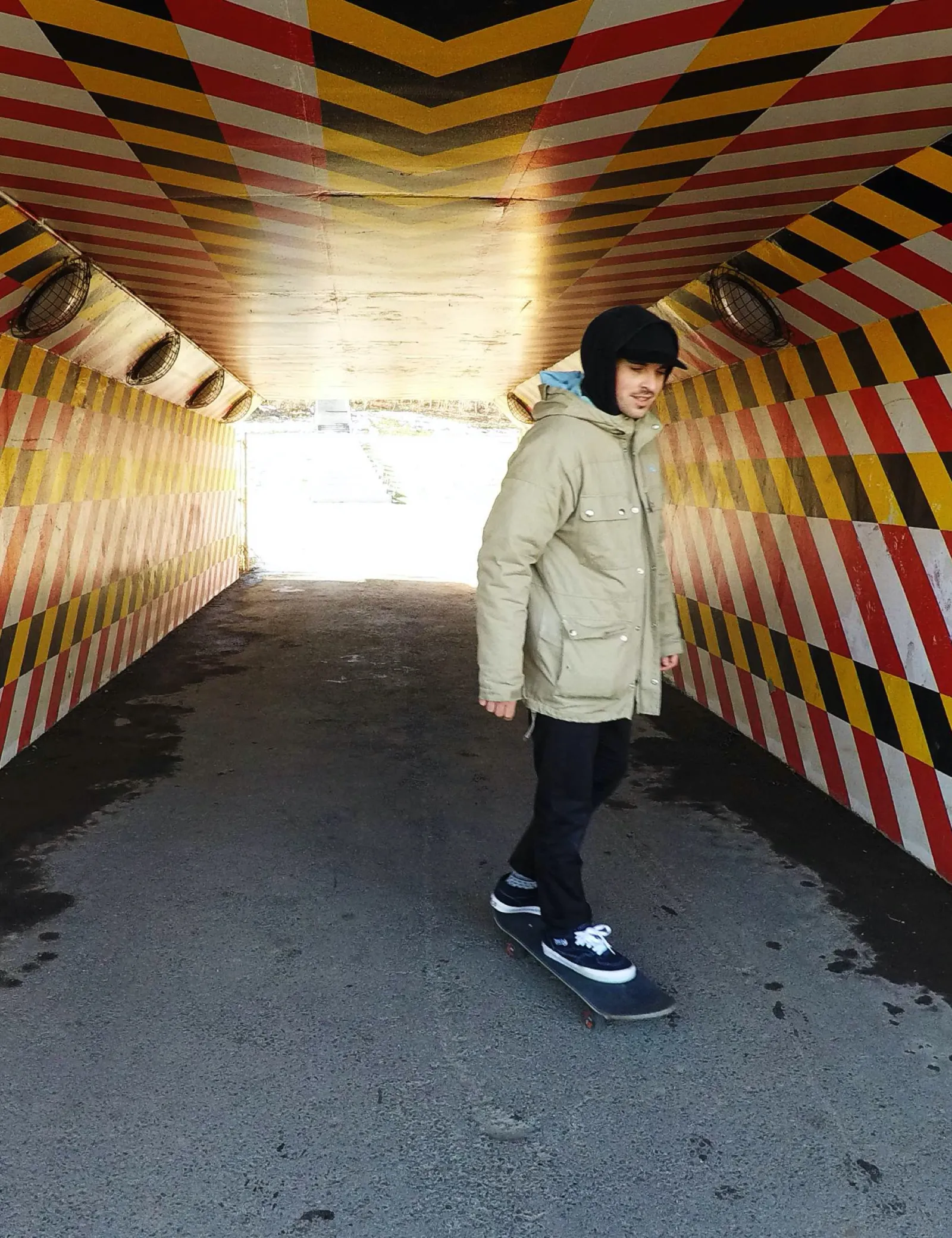 Skating through colourful tunnel