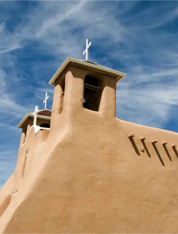 Adobe church with blue sky