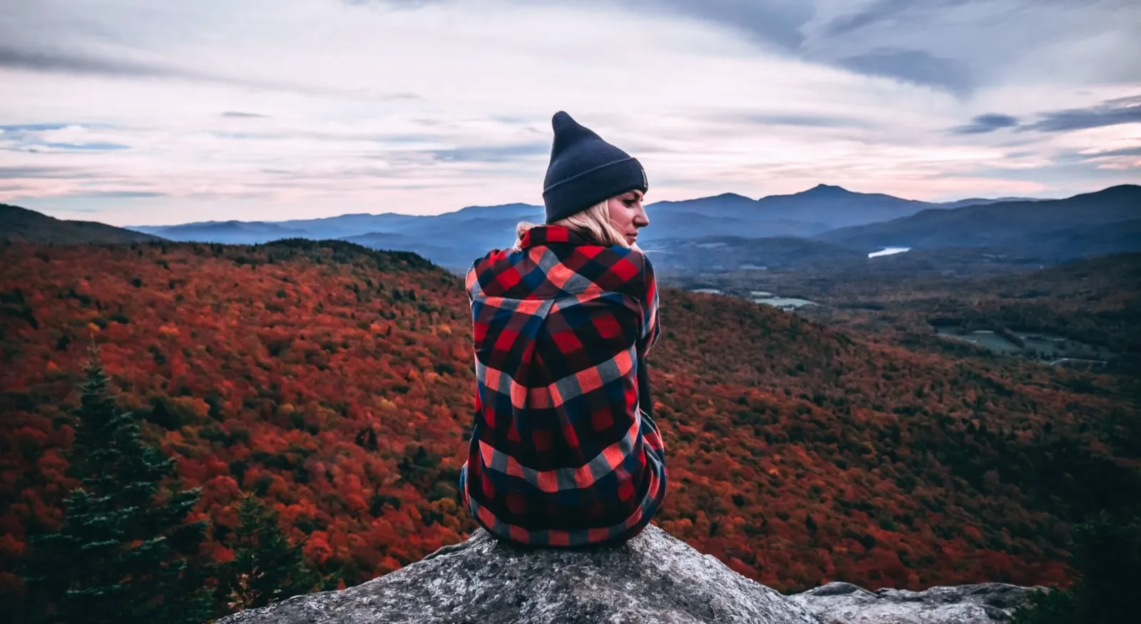 Girl sitting in-front of Vermont view