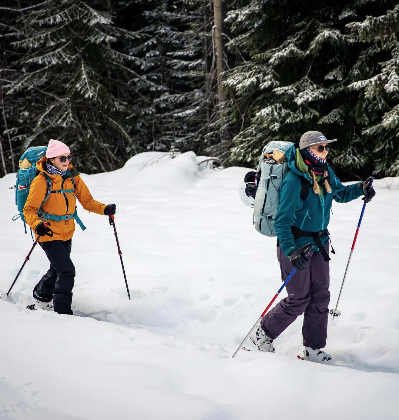 2 Origin employees ski touring