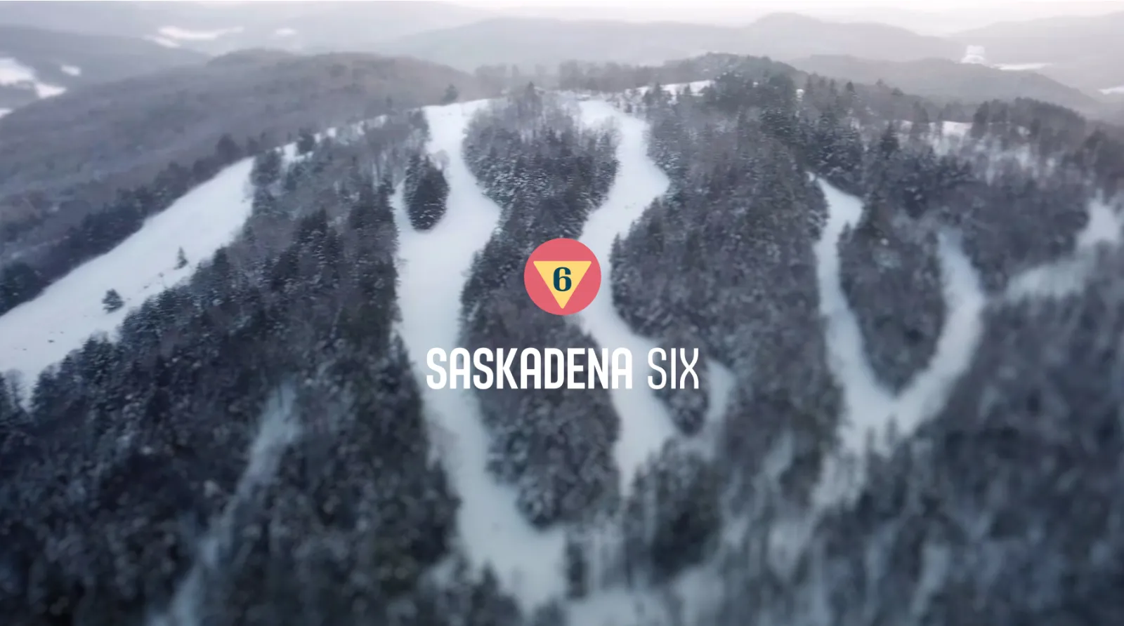 Saskadena Six logo over mountain