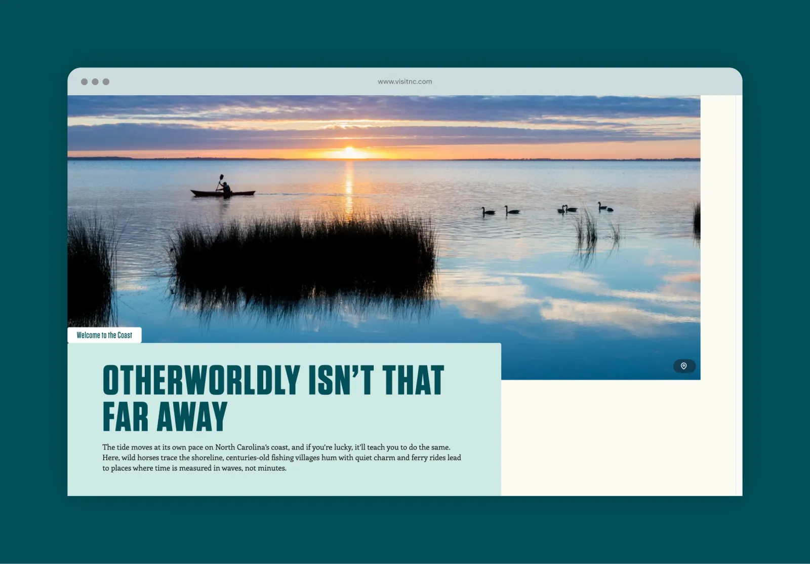 Kayaker at sunset on calm lake with reeds and ducks.