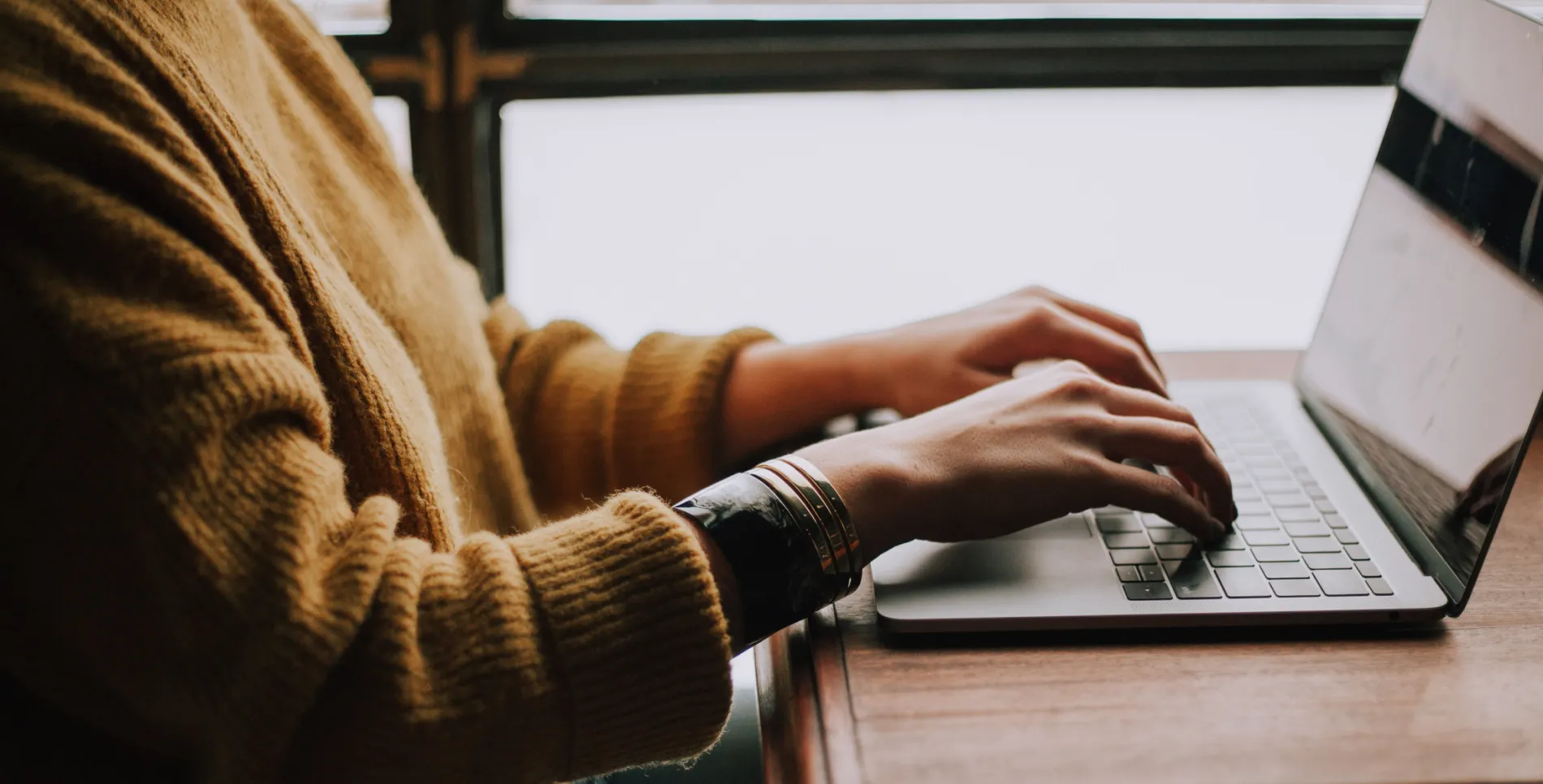 Person typing on a laptop