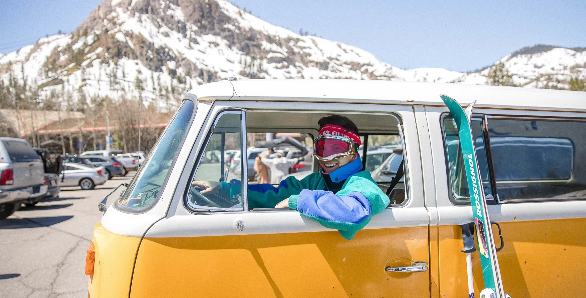 Spring skier in a yellow van