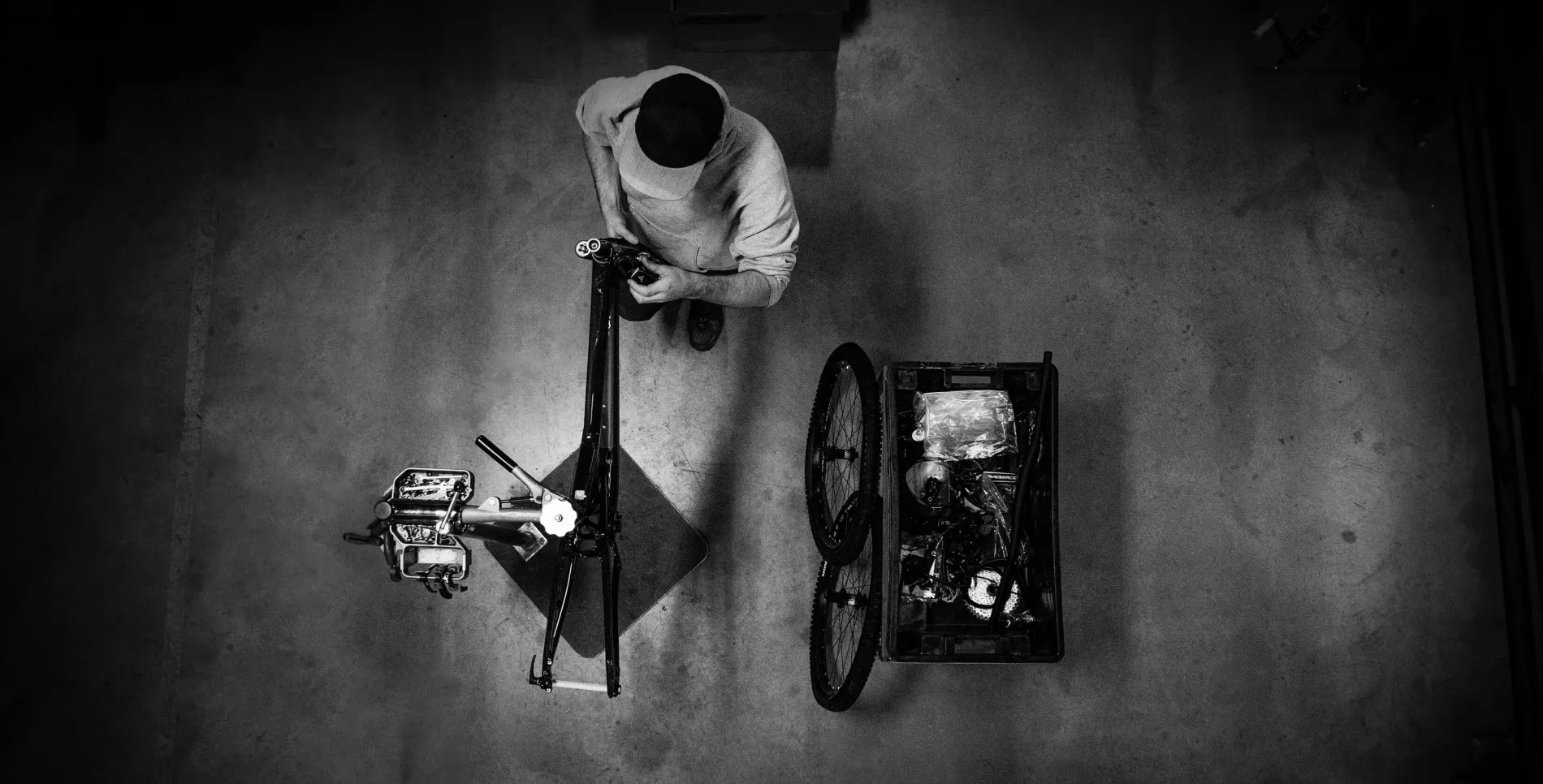 person building bike by hand
