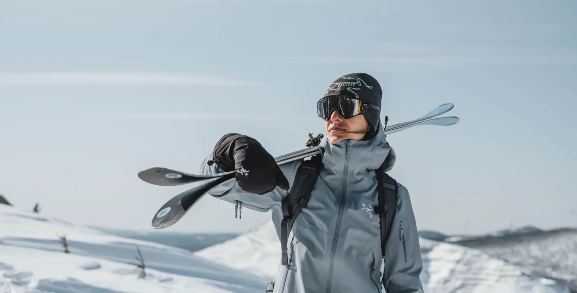 Women carrying skis